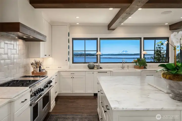 Chefs kitchen with Wolf, Sub Zero, Calacutta slab marble and more views!