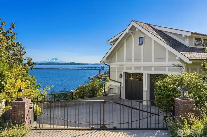 Gated drive to two car garage.
