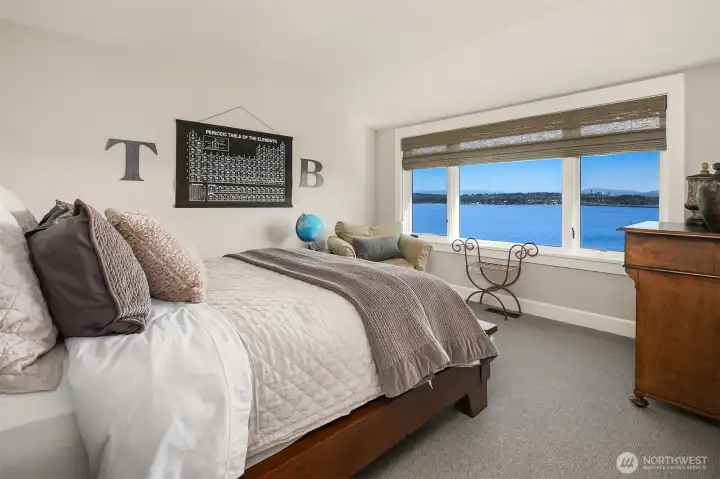 Upper level secondary bedroom with views.