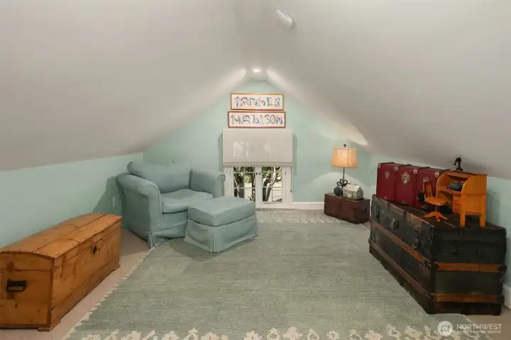 Doll house finished dormer off upper level guest bath.