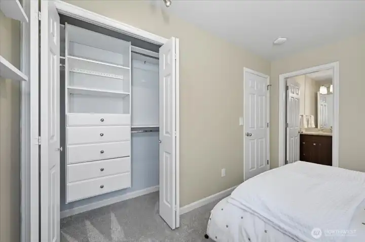 Closet built-ins for plenty of storage and private full bathroom