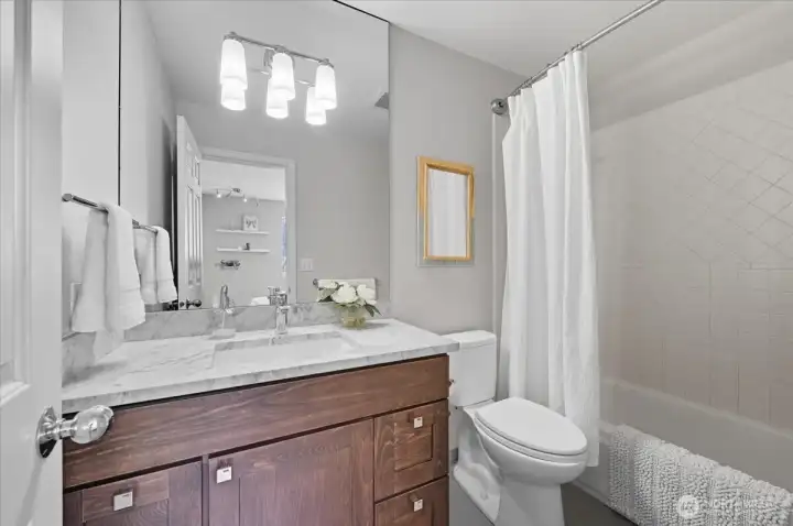 Private bathroom off second bedroom