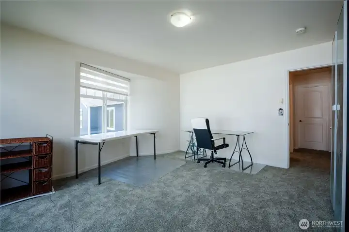 Upstairs bedroom, office or craft room.