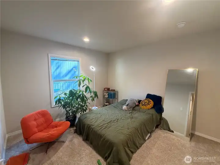 Spacious primary bedroom is the perfect spot to relax after a long day!