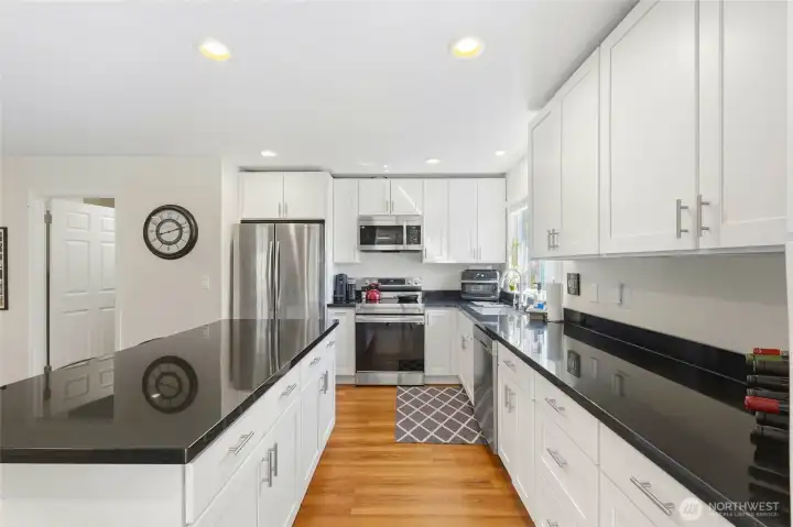 White cabinets and granite countertops