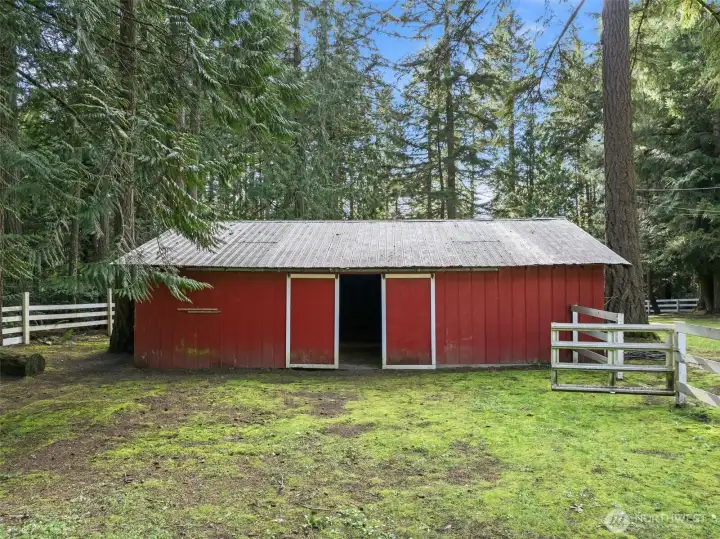 Three stall barn with tack room, electricity and water.