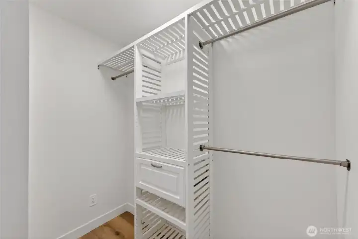 The primary suite is complete with a walk-in closet.