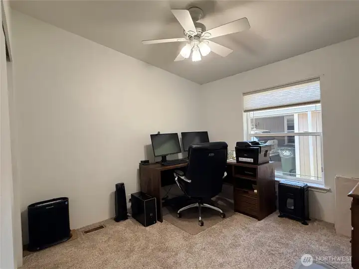 Guest bedroom, currently being used as a den/office.