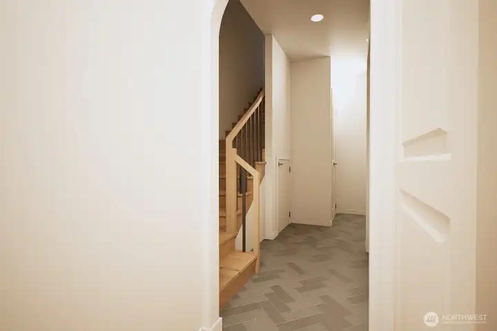 Professional Design rendering of planned stairs to bonus room over garage. Stairs will be carpet.