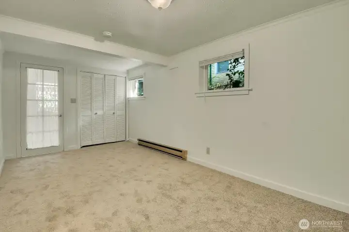 Fresh carpeting, paint, and a French door make this bonus room lovely. Fresh carpeting, paint, and a French door make this bonus room lovely.