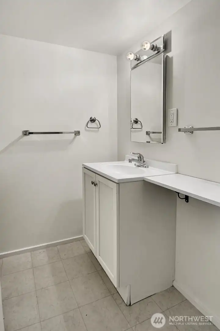 Lower-level bathroom. Shower to the left of this photo. Lower-level bathroom. Shower to the left of this photo.