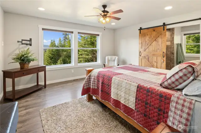 Primary Suite features beautiful Stuart Range views, a  custom gorgeous walk-in shower, double sinks, & a big walk-in CLoset!