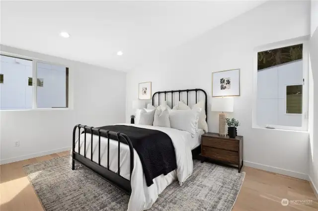 Spacious and bright bedroom featuring clean lines and modern finishes for a relaxing retreat.