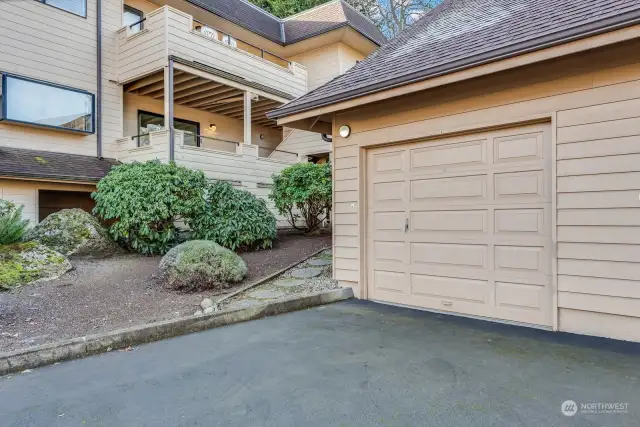 2nd Garage is detached located right outside condo shown on left, with built in work bench and full length overhead storage room