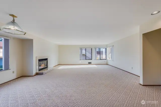 Remarkable Light shines through on your open floor plan! Including far corner is all windows