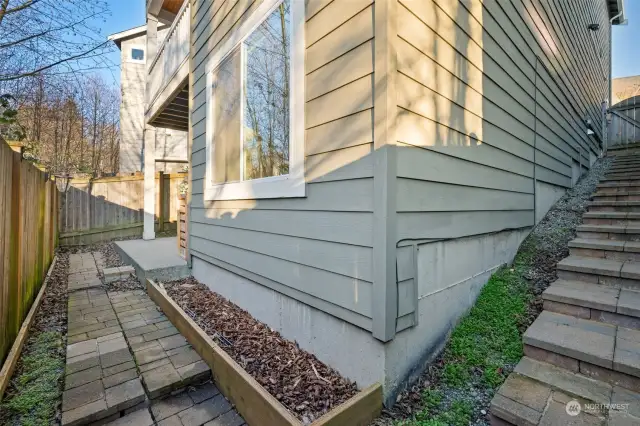 Apartment sliders to this area and gentle stairs to front of home.