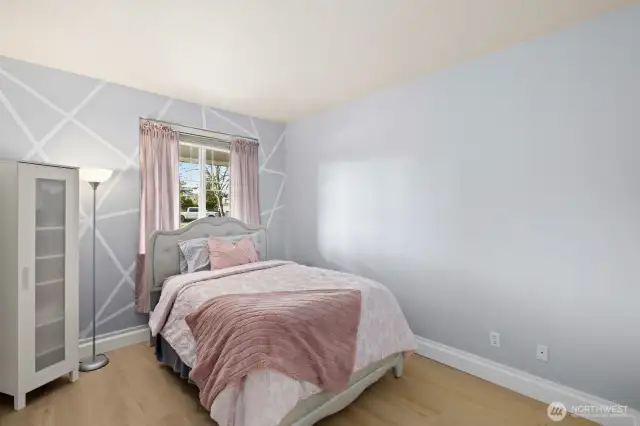 Second bedroom is also of excellent size and could also fit a king bed or set up for an office/art room, etc.