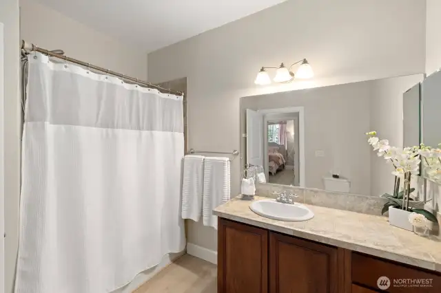 Guest bathroom in hallway. Love the counter space in these bathrooms.