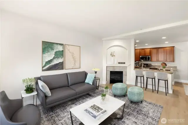 Open concept living with ample room for entertaining company. (Virtual Staging)