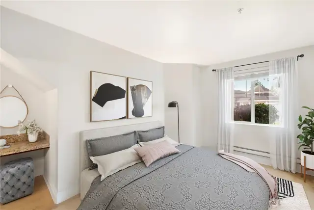 Primary suite with work station and full bathroom. Room for a king bed and more! (Virtual Staging)