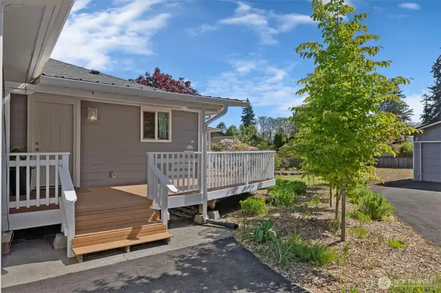 Side view of deck and beautiful landscaping