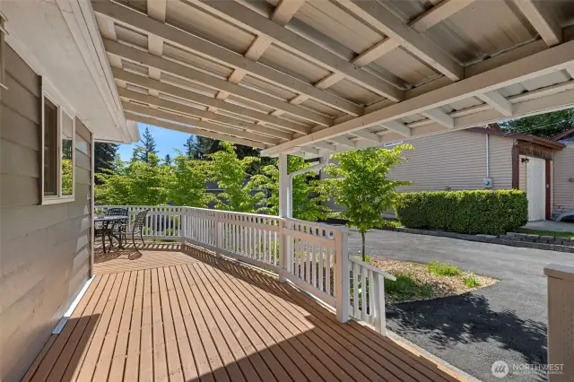 Deck is partially covered and wraps around house. New paint inside and out