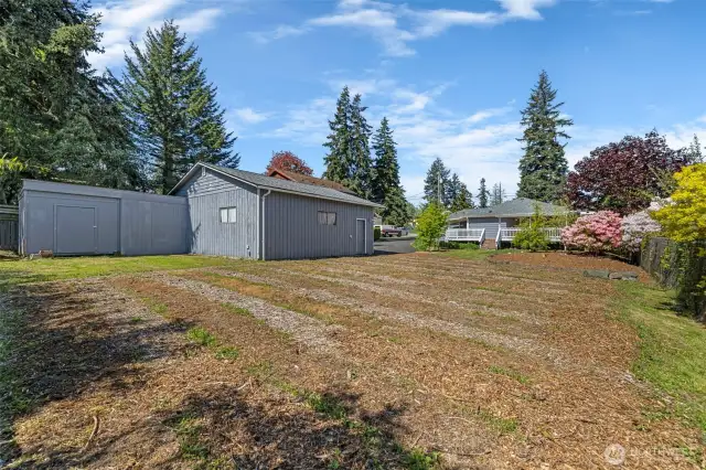 So much space for a huge garden! Back shed attached to shop