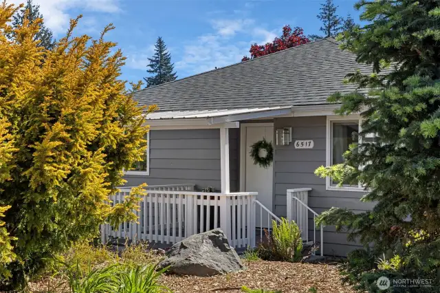 Peek a boo view of this darling covered front porch