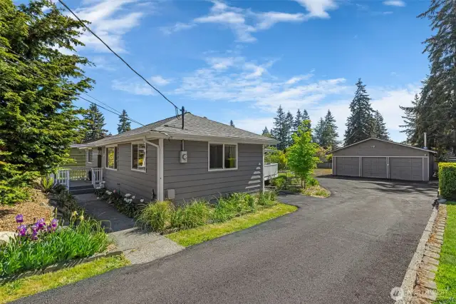 Massive driveway recently repaved. Tons of room for entertaining and vehicles