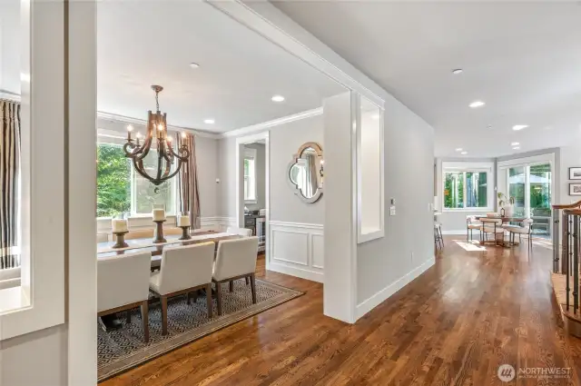 Open and airy formal dining room with dramatic architectural details.