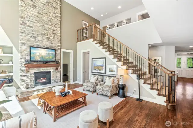 Rich hardwood floors and luxurious finishes throughout.
