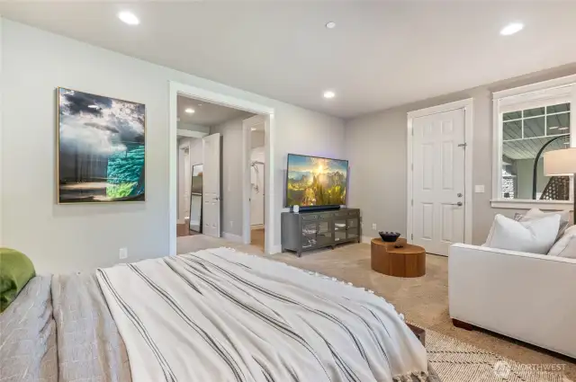 2nd primary suite on main level with private entrance, walk-in closet, bathroom,covered porch access.