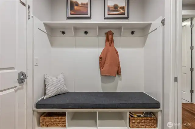 Mudroom with thoughtful storage and organization.