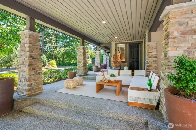 Charming covered front porch with stately columns.
