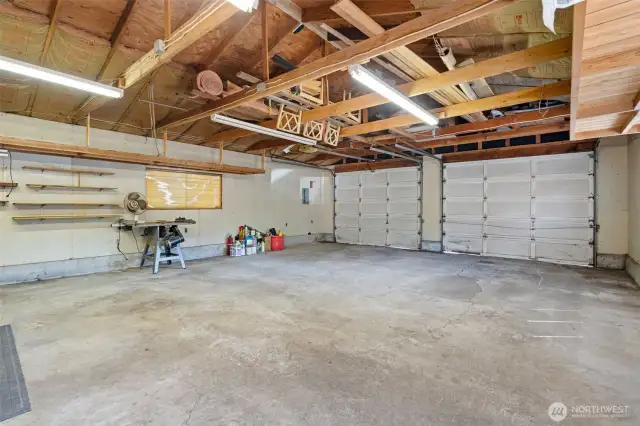 26' x 34' 4-car garage/shop offering generous space for vehicles, tools, and projects, perfect for hobbyists or extra storage.