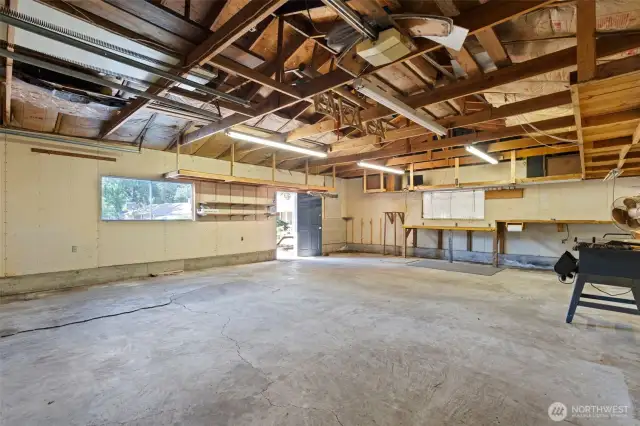 26' x 34' garage/shop offering generous space for vehicles, tools, and projects, perfect for hobbyists or extra storage.