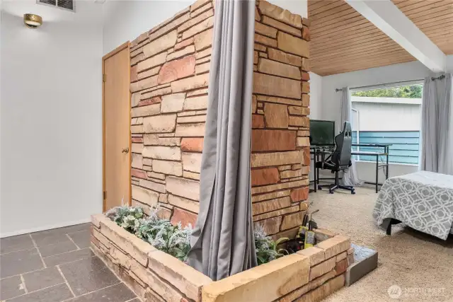 They don't make fancy chimney/decor rock wall/planting area like this anymore