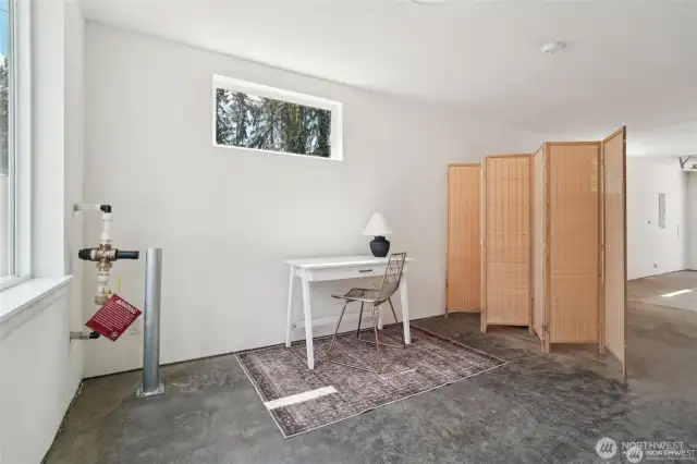 Garage is huge! Opportunity to recapture space for 3rd bedroom, office or flex space. Photo of staged unit 20311 A