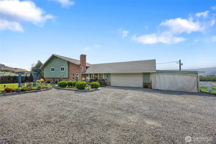 Covered parking for 4 cars and plenty of room for RV, friends, etc