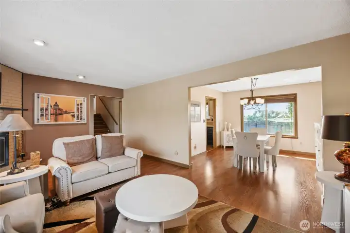 Living room flowing into the dining room - HUGE views from dining room window