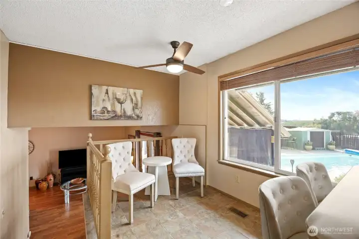 Charming breakfast nook overlooking pool area