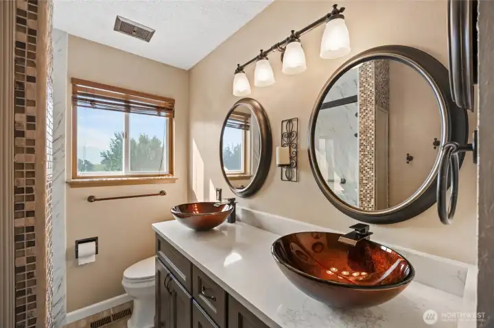 Upstairs updated bath - double sinks, walk in shower