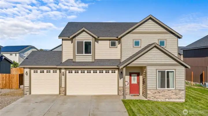 This beautiful 2015 home with 3-car garage is filled with curb appeal!