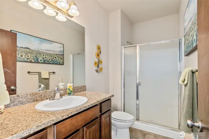 Main level 3/4 bath perfect for guest and family alike.
