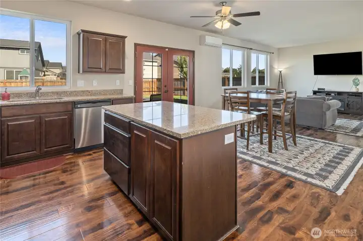 Because every party gravitates to the kitchen! With newer stainless appliances, granite counters, tons of storage (hello, pantry & under-stair closet), and room for bar stools and a breakfast table, this open-concept space connects seamlessly to the living room and backyard.