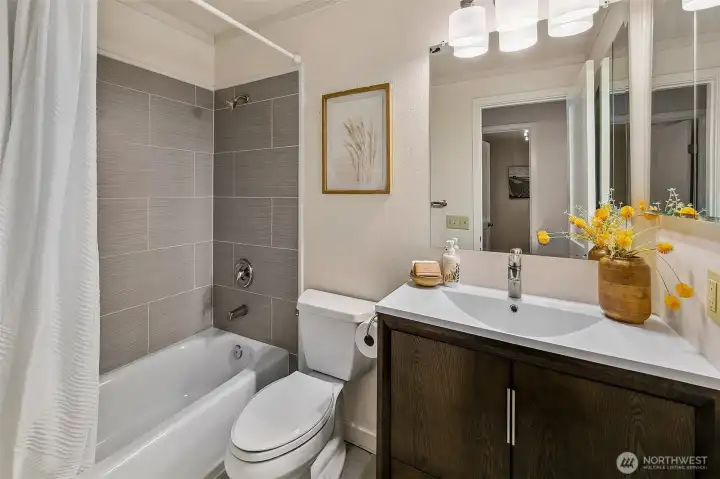 Full bath on the main floor.  *Photo is from when the condo was staged.