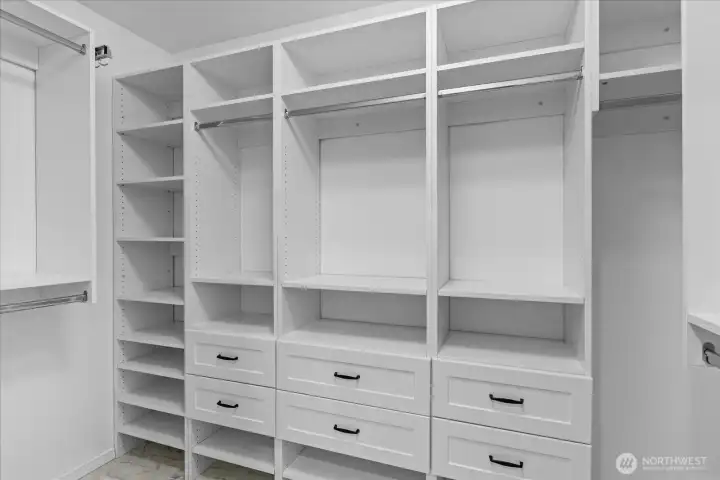 Walk-in closet with amazing built in storage!