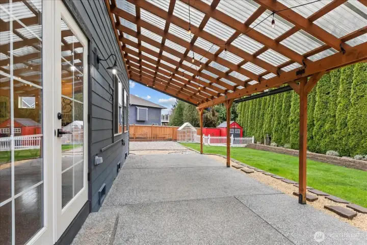 Large, covered back patio for summer BBQs & entertaining!
