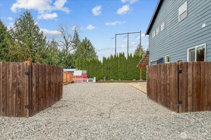 Double gates open to your large RV/toy parking!