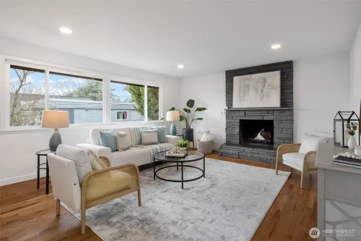 Light and bright living room has big west facing windows.